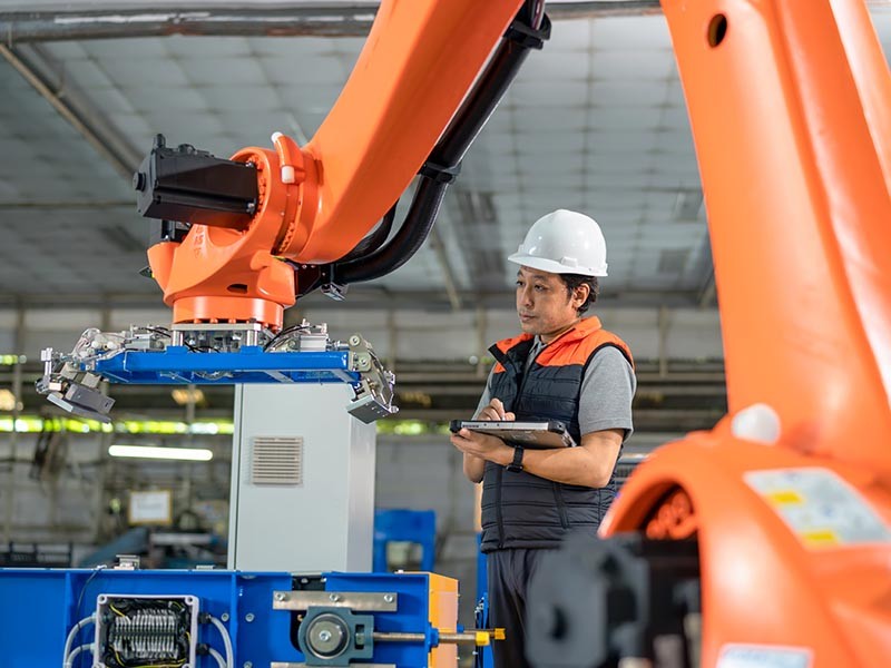 A worker is working in factory