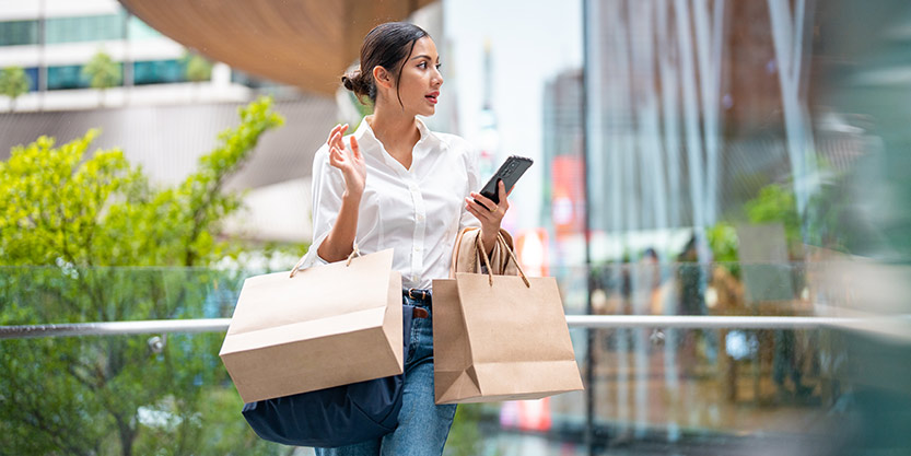 Portrait of a asian woman outside a luxury mall 