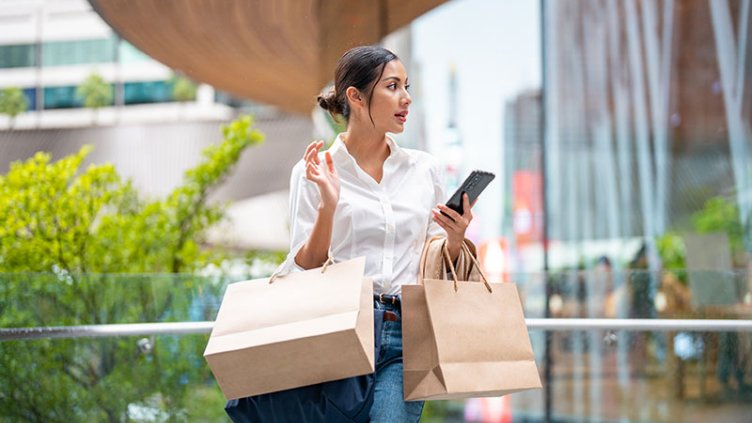 Portrait of a asian woman outside a luxury mall 