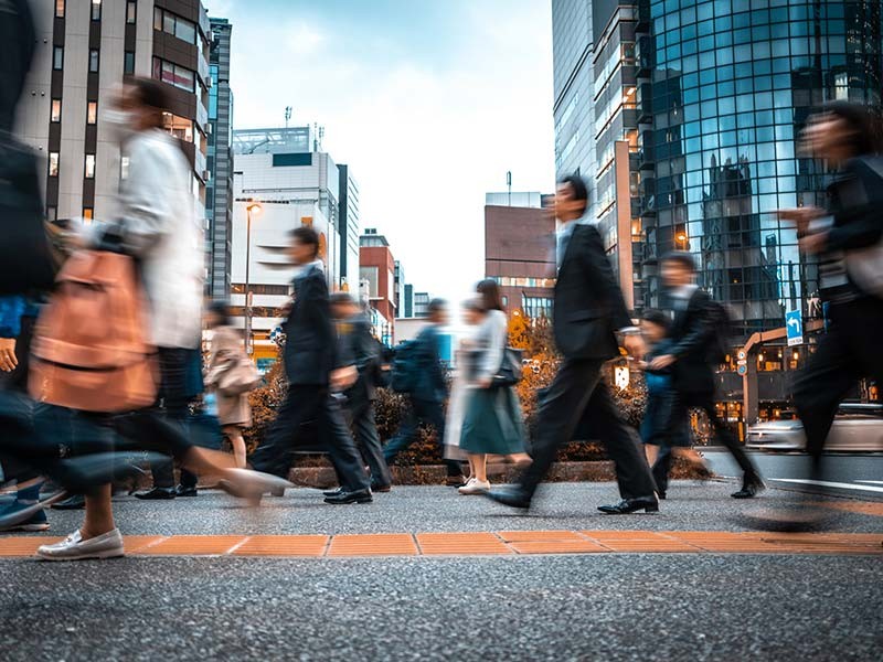 People going towards the office in a smart city