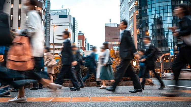 People going towards the office in a smart city