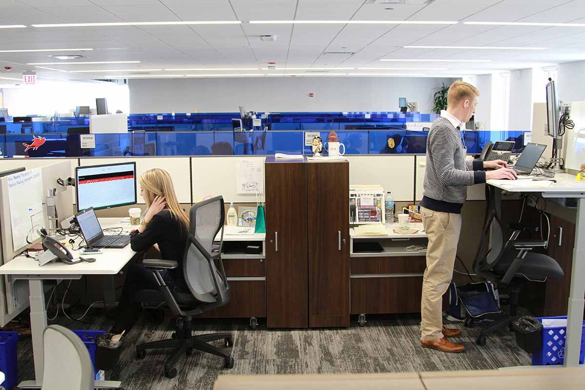 View of people working on there workstations