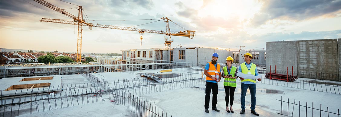 Construction engineers working on site