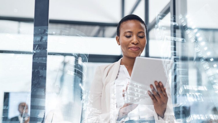 Women working on tablet and smiling 