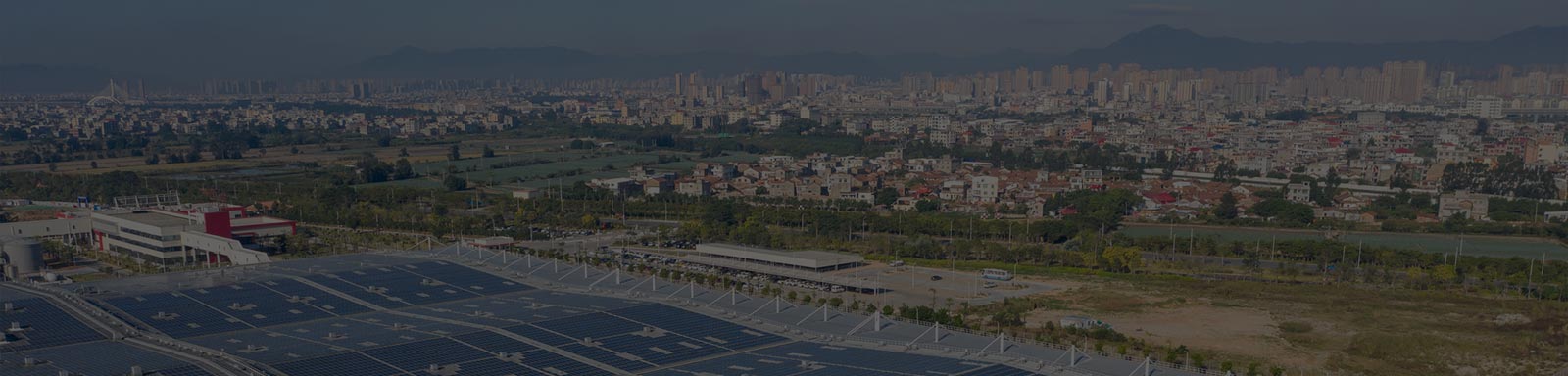 Drone aerial photography of solar power plant on the roof of the factory