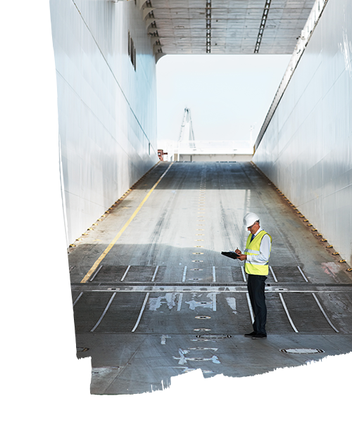 A man working inside the parking area