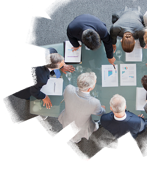 View of investors discussing the data inside the meeting room from top in the real estate building